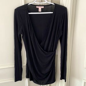 A pea in the pod size small long sleeve maternity black top but good for nursing